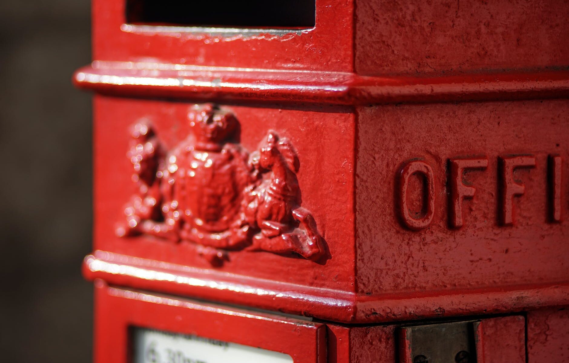 red and white metal mail box